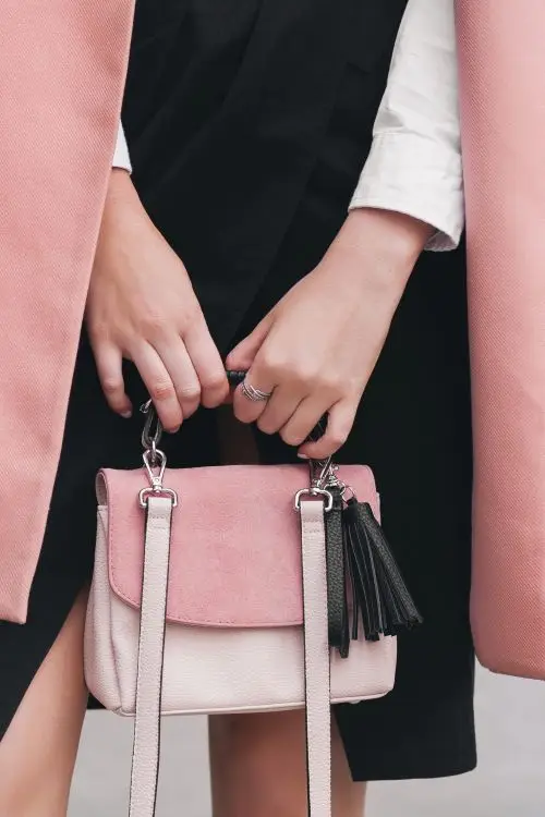 Trendy spring fashion featuring a stylish purse.